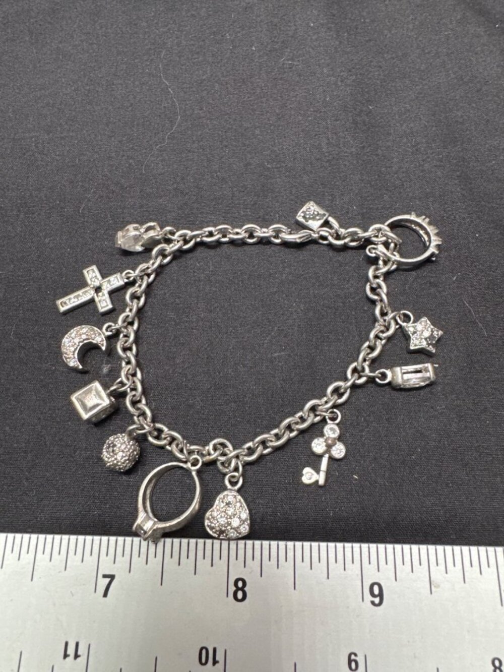 Silver Charm Bracelet With Rhinestone Embellished Charms Including Cross Heart M